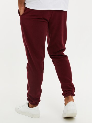 Tapered Pantaloni di Threadbare in rosso