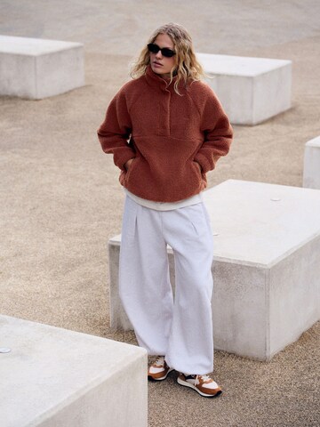 Pull-over self. en marron