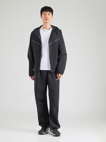 Nike Sportswear Λειτουργικό μπουφάν 'TCH' σε μαύρο
