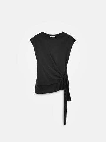 Dilvin T-Shirts in Schwarz: Vorderseite
