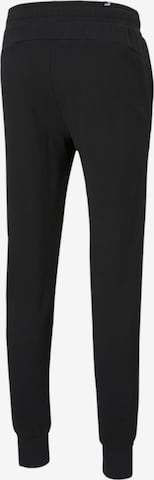 Effilé Pantalon de sport PUMA en noir