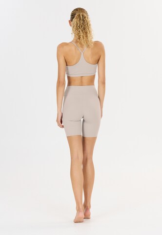 Athlecia Low Support Sport-BH 'Blossom' in Grau