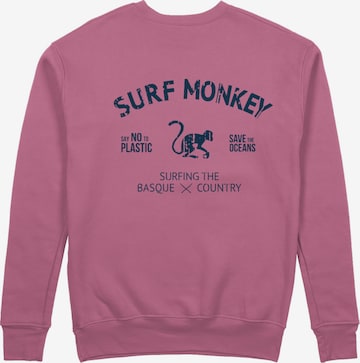 Surf Monkey Sweatshirt 'Rette das Ozean' in Pink: front
