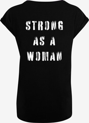 Merchcode T-Shirt 'WD - Strong As A Woman' in Schwarz