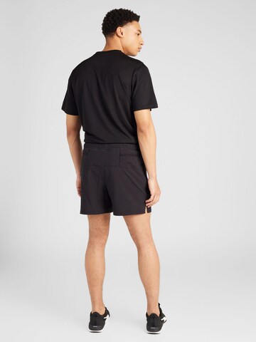 PUMA Regular Sportshorts 'Seasons' in Schwarz