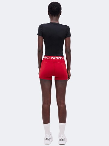 NIKESkinny Sportske hlače 'NP 365' - crvena boja