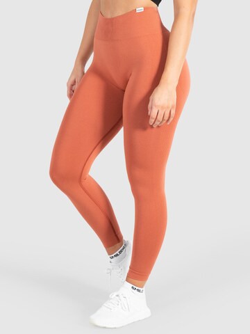 Smilodox Skinny Sportbroek 'Amaze Scrunch' in Oranje