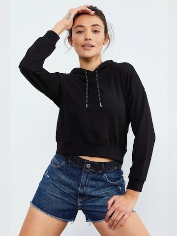 Sweat-shirt Tommy Life en noir : devant
