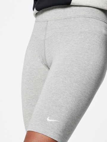 pelēks Nike Sportswear Šaurs Legingi 'Essential'