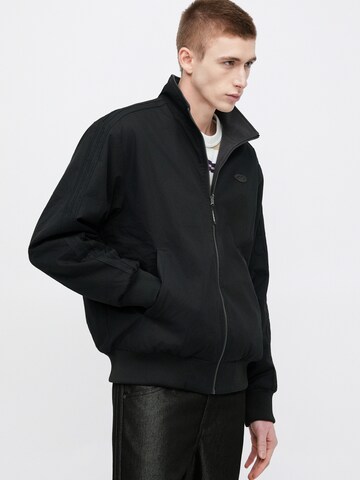 ADIDAS ORIGINALS Between-season jacket 'FIREBIRD' in Black