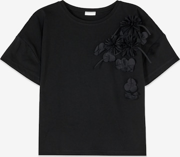 Top di oltre in nero: frontale