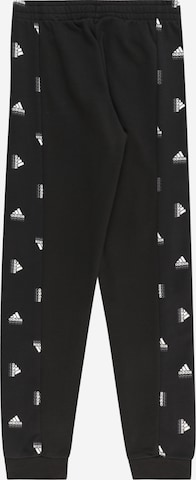 ADIDAS SPORTSWEAR Tapered Sports trousers 'Brand Love Side Insert Print' in Black