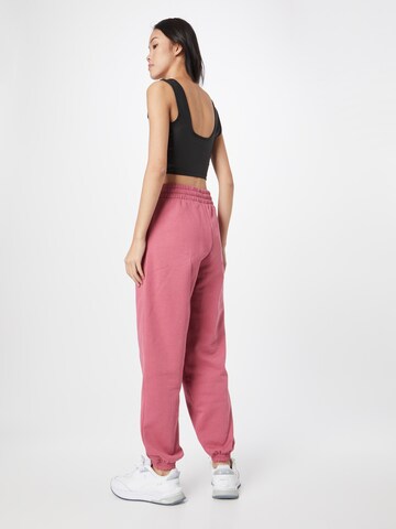 PUMA Tapered Sportbroek 'Classics' in Lila