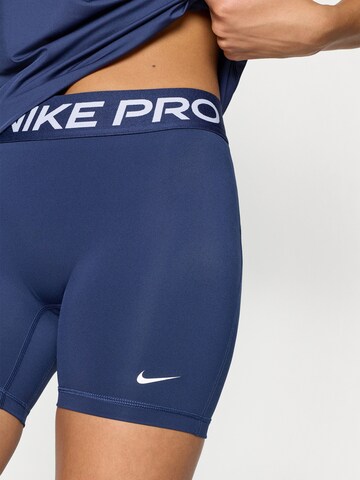 NIKE Skinny Športne hlače | modra barva