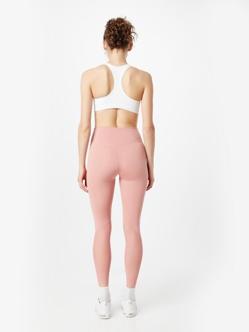 Skinny Pantaloni sportivi 'One' di NIKE in rosa