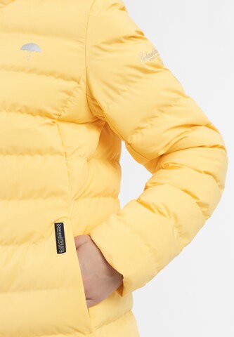 Schmuddelwedda Toiminnallinen takki 'Kilata' värissä keltainen