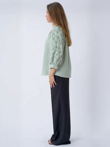 Maglietta ' Freda ' di TEESHOPPEN in verde: lato