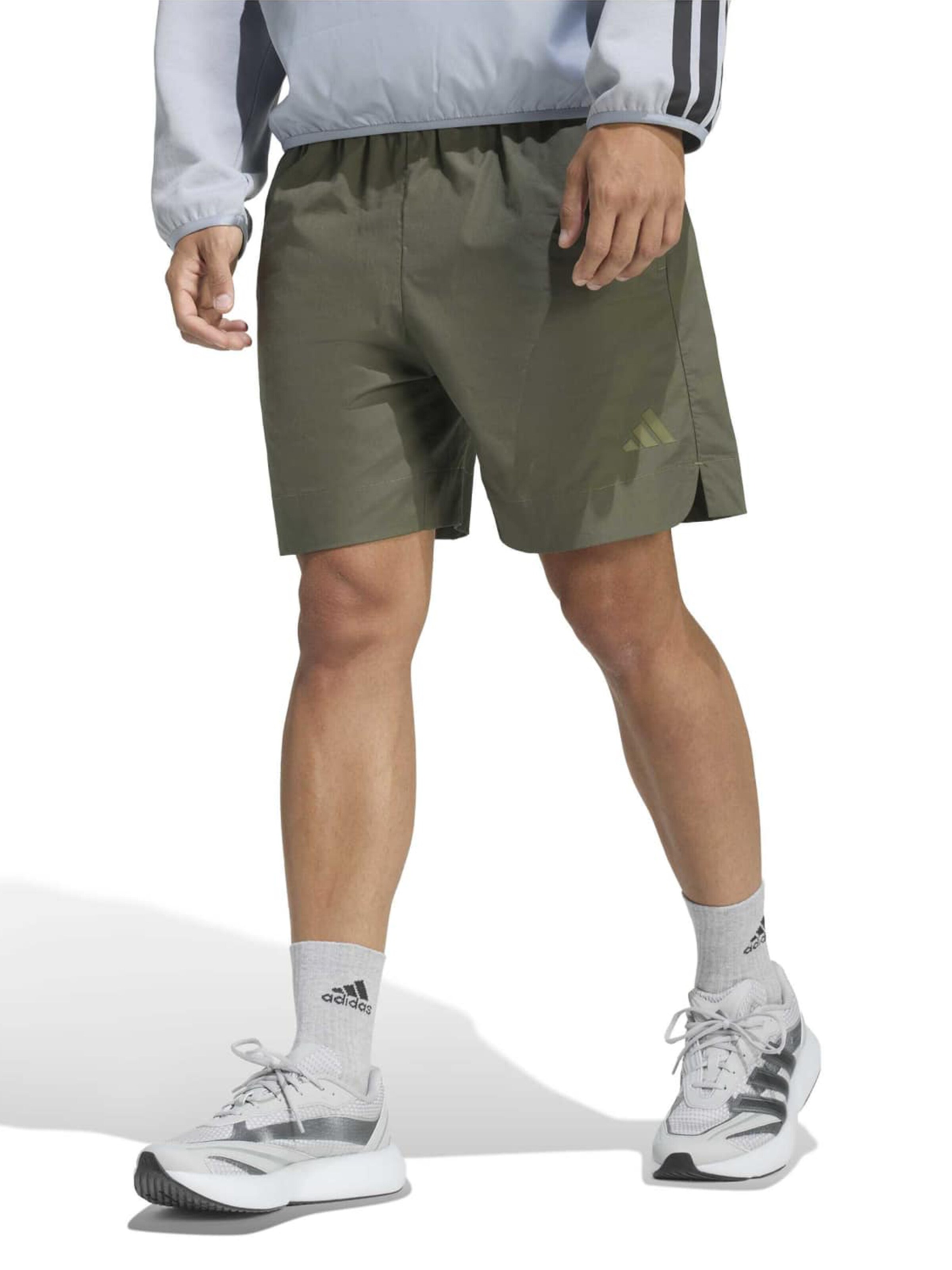 ADIDAS SPORTSWEAR Lużny krój Spodnie sportowe w kolorze zielony: przód