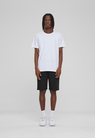 Urban Classics Regular Trousers in Black: front
