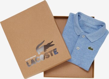 LACOSTE Romper/Bodysuit in Blue