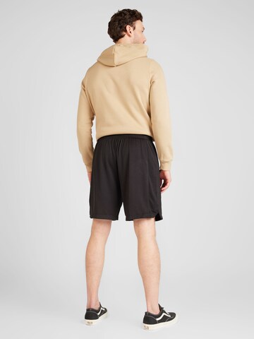 PUMA Regular Sportshorts in Schwarz