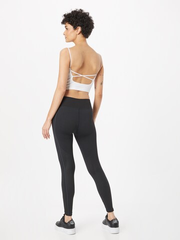 UNDER ARMOUR Skinny Sporthose in Schwarz