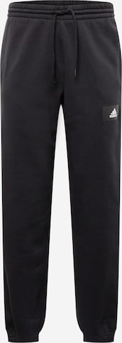 ADIDAS SPORTSWEAR Tapered Workout Pants 'Essentials Feelvivid  Fleece Straight' in Black: front