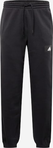 ADIDAS SPORTSWEAR Avsmalnet Sportsbukser 'Essentials Feelvivid  Fleece Straight' i svart: forside