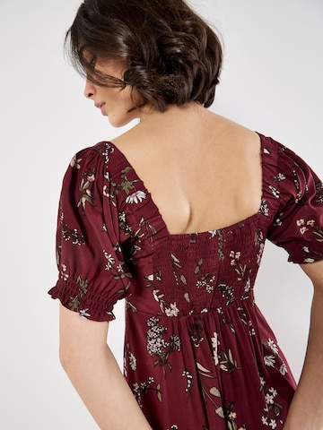 Robe ' ' Apricot en rouge