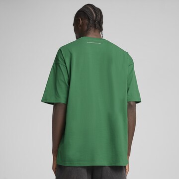 PUMA Functioneel shirt 'Porsche Legacy' in Groen
