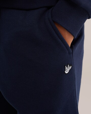 WE Fashion - Tapered Calças em azul