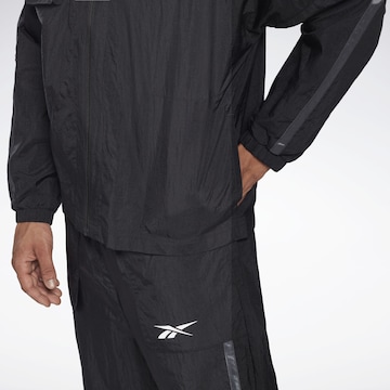 Reebok Športna jakna | črna barva