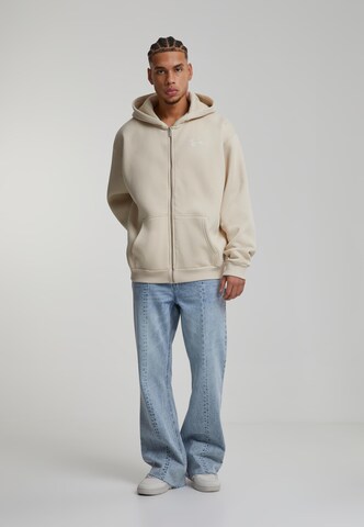 Karl Kani - Sudadera con cremallera 'Essential' en beige