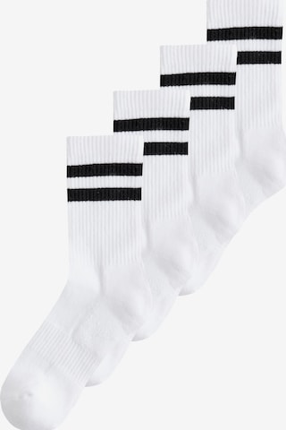 Next Urheilusukat värissä valkoinen: etupuoli