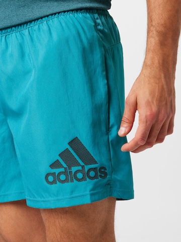ADIDAS SPORTSWEAR Normalny krój Spodnie sportowe 'Run It' w kolorze niebieski