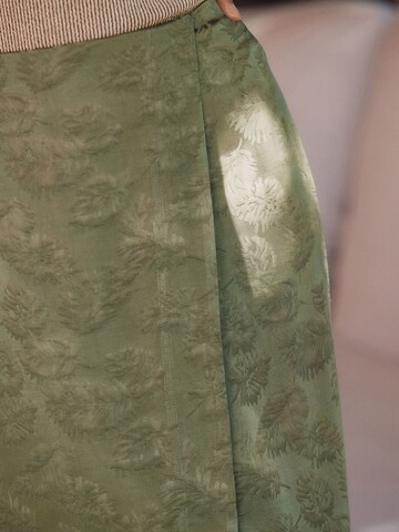 Next - Saia em verde