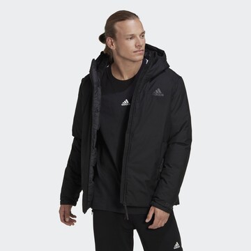 ADIDAS SPORTSWEAR Athletic Jacket 'Traveer' in Black: front