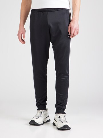 Champion Authentic Athletic Apparel Tapered Nadrág - fekete: elől