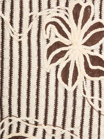 Vêtement de plage Marks & Spencer en beige