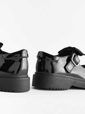 Next - Bailarina en negro