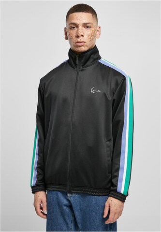 Karl Kani Between-Season Jacket in Black: front