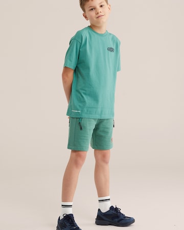 WE Fashion Regular Housut värissä vihreä