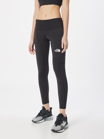 THE NORTH FACE Skinny Workout Pants in Black: front