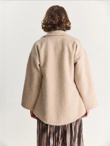 Cardigan Bianco Lucci en beige