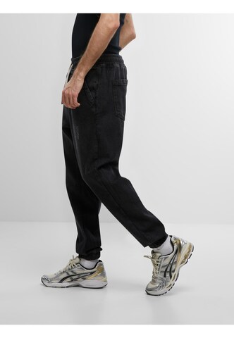 Urban Classics Tapered Jeans in Schwarz