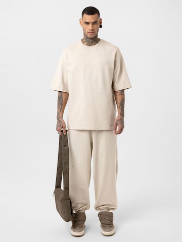 Abito da casa di Dandalo in beige: frontale