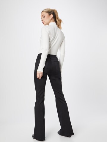 FRAME Flared Trousers in Black