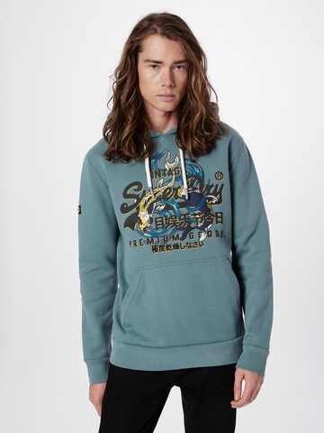 Sweat-shirt Superdry en bleu : devant
