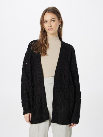 Cardigan 'Goldie' ABOUT YOU en noir : devant