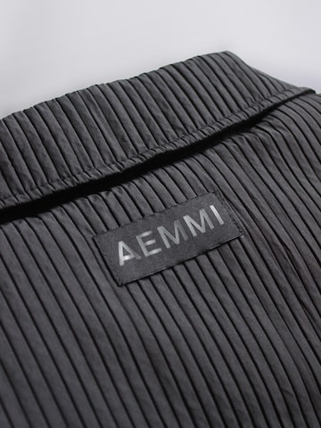 AEMMI Between-Seasons Coat in Black